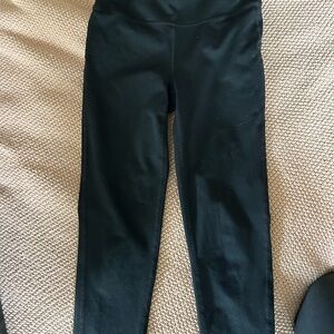 Women’s lululemon Black Leggings size 4 with repaired rip - see last picture